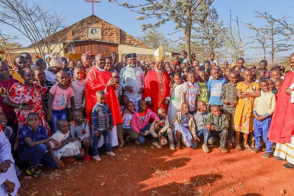 The Bishop of Meru and Fr. John Machali with the parish community