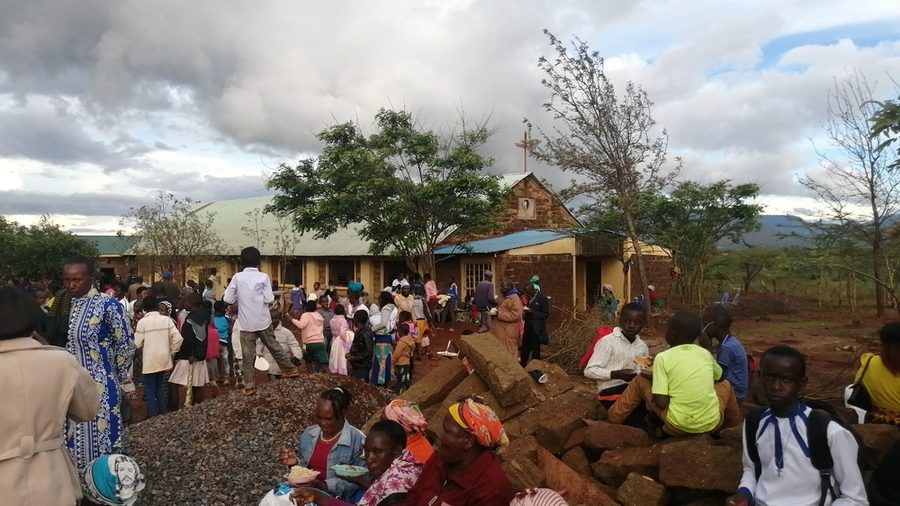 Parishioners gathered outside the parish church
